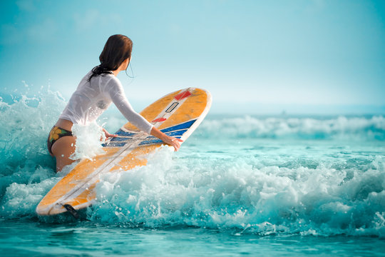 surfing girl adventure