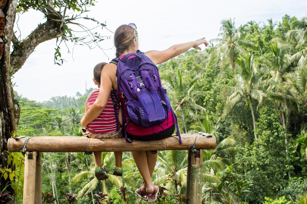 the foreign lady looking Sri Lanka's nature with children