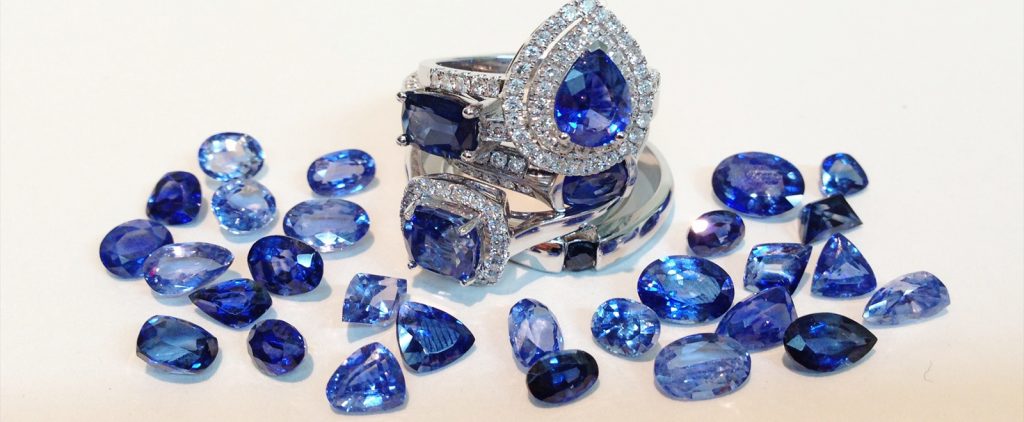 some blue gemstone and Rings in the table