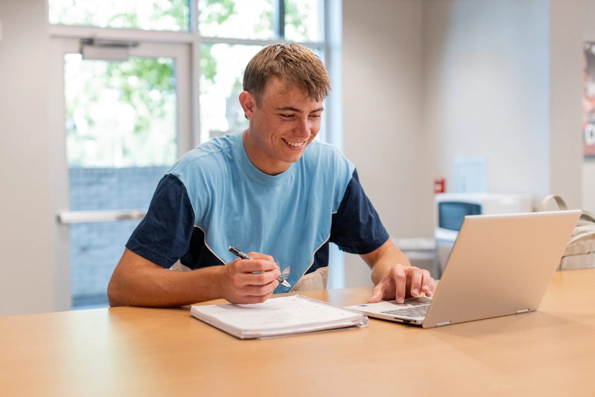 A prospective student researching courses during an intake